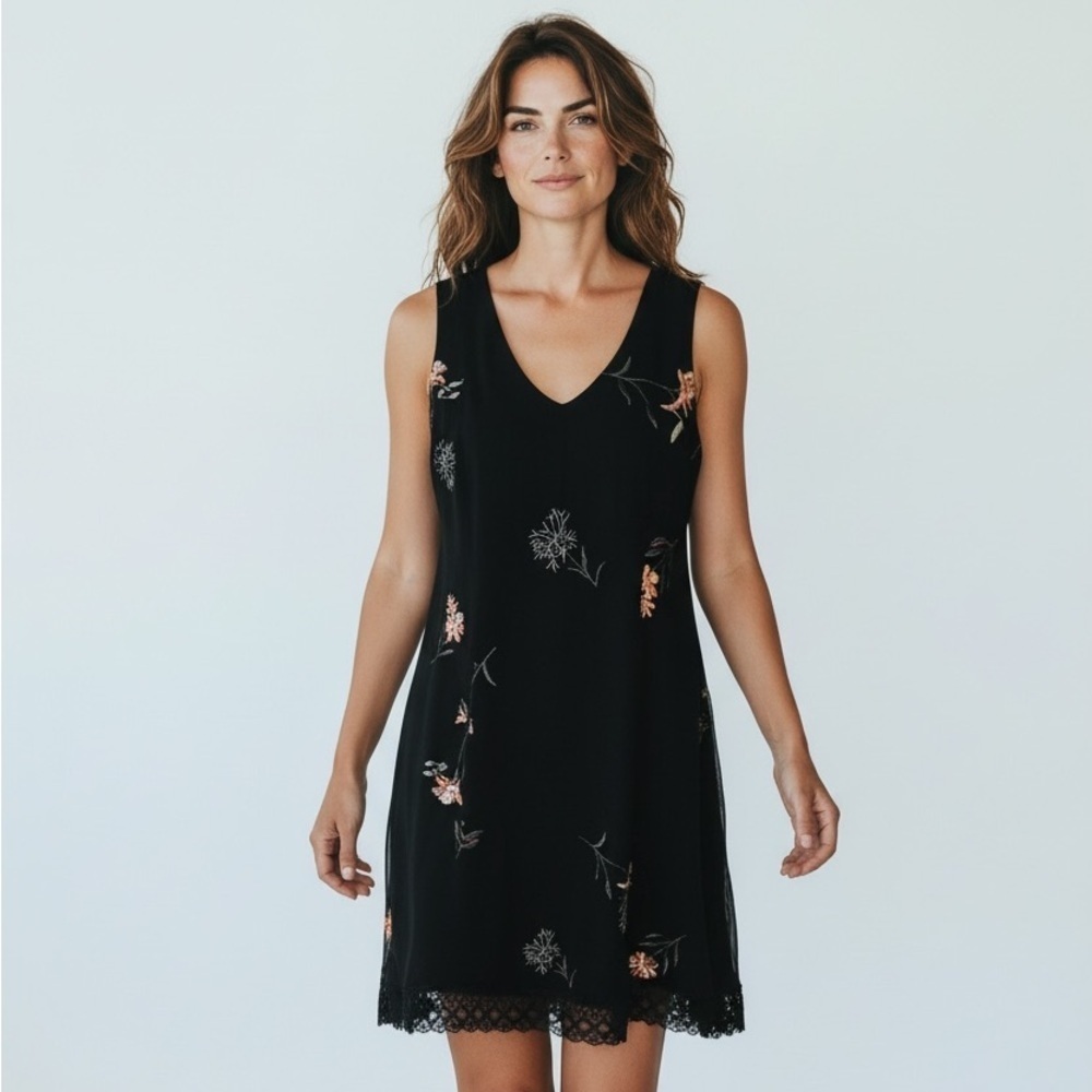 Roz and Ali black dress size 10 worn once. Beautiful embroidery. Lace hem.